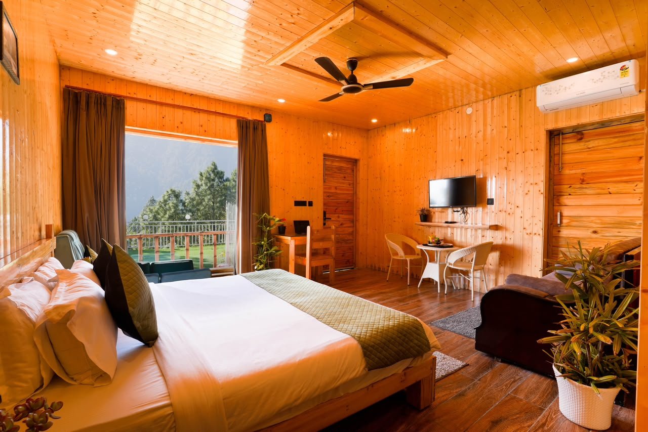 Wooden room with TV and balcony view - Hamilton Palace Lansdowne